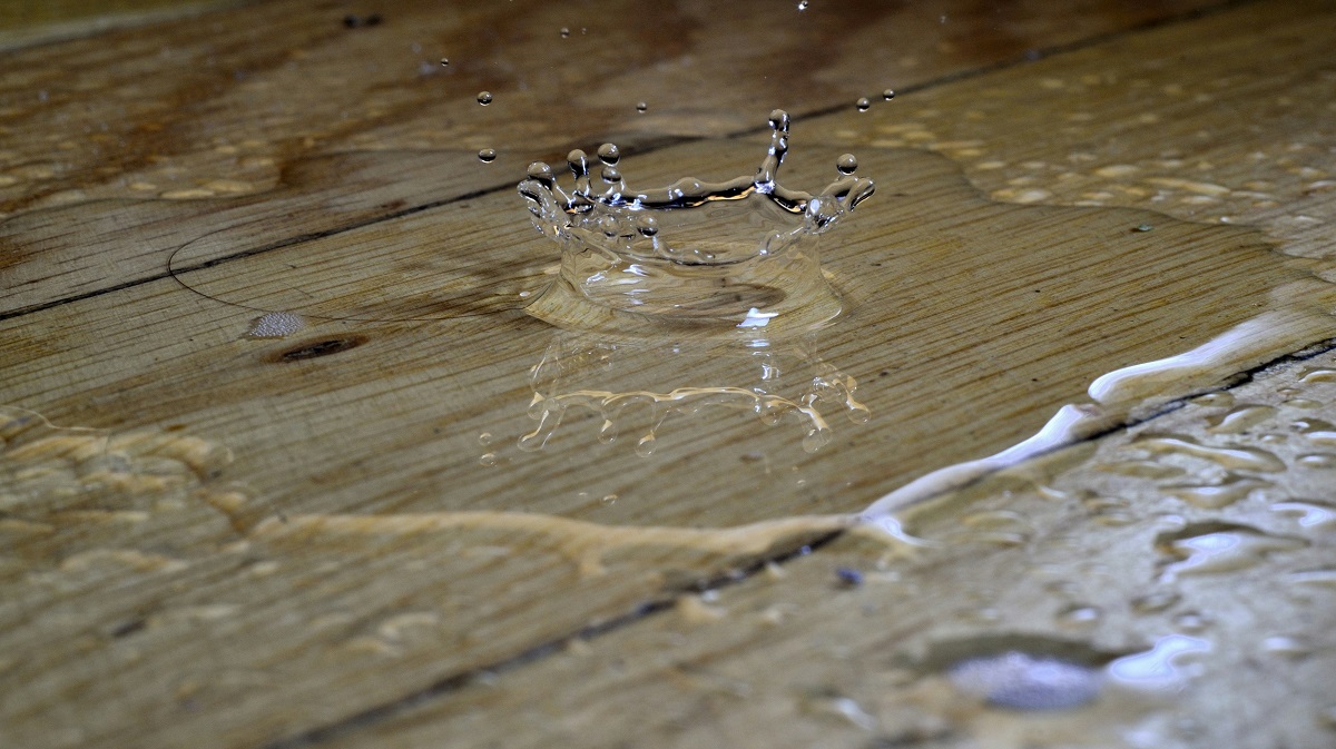 water dripping to hardwood flooring